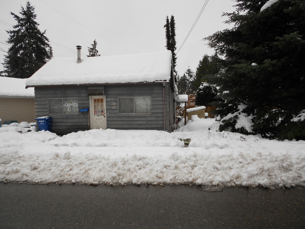 Our house and yard with lots of snow